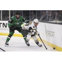 Texas Stars' Kyle Capobianco and Henderson Silver Knights' Grigori Denisenko in action